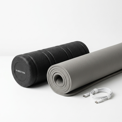 RollWave vibrating foam roller packshot with grey yoga mat and USB-C cable